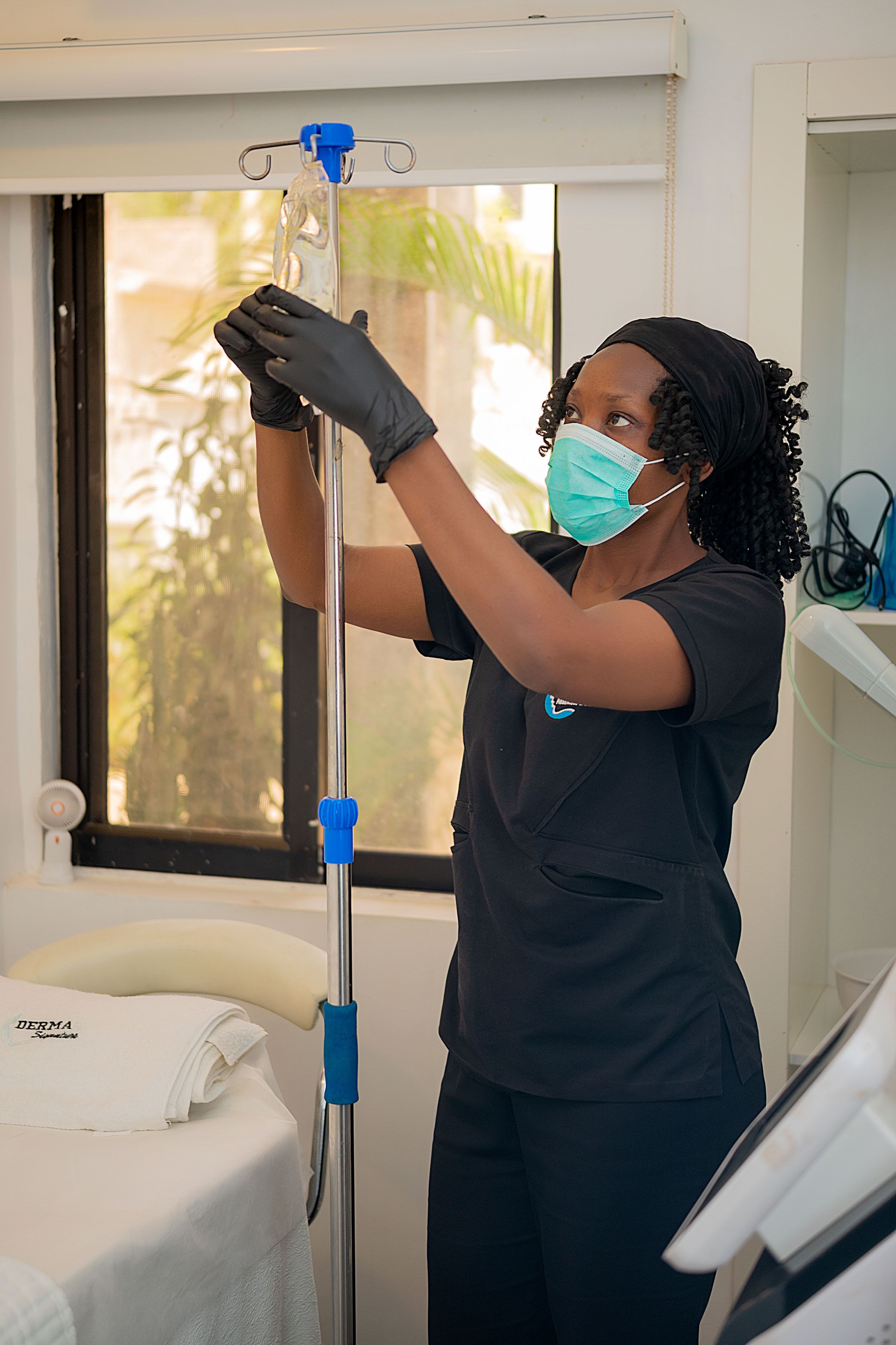 Nurse preparing an IV drip infusion